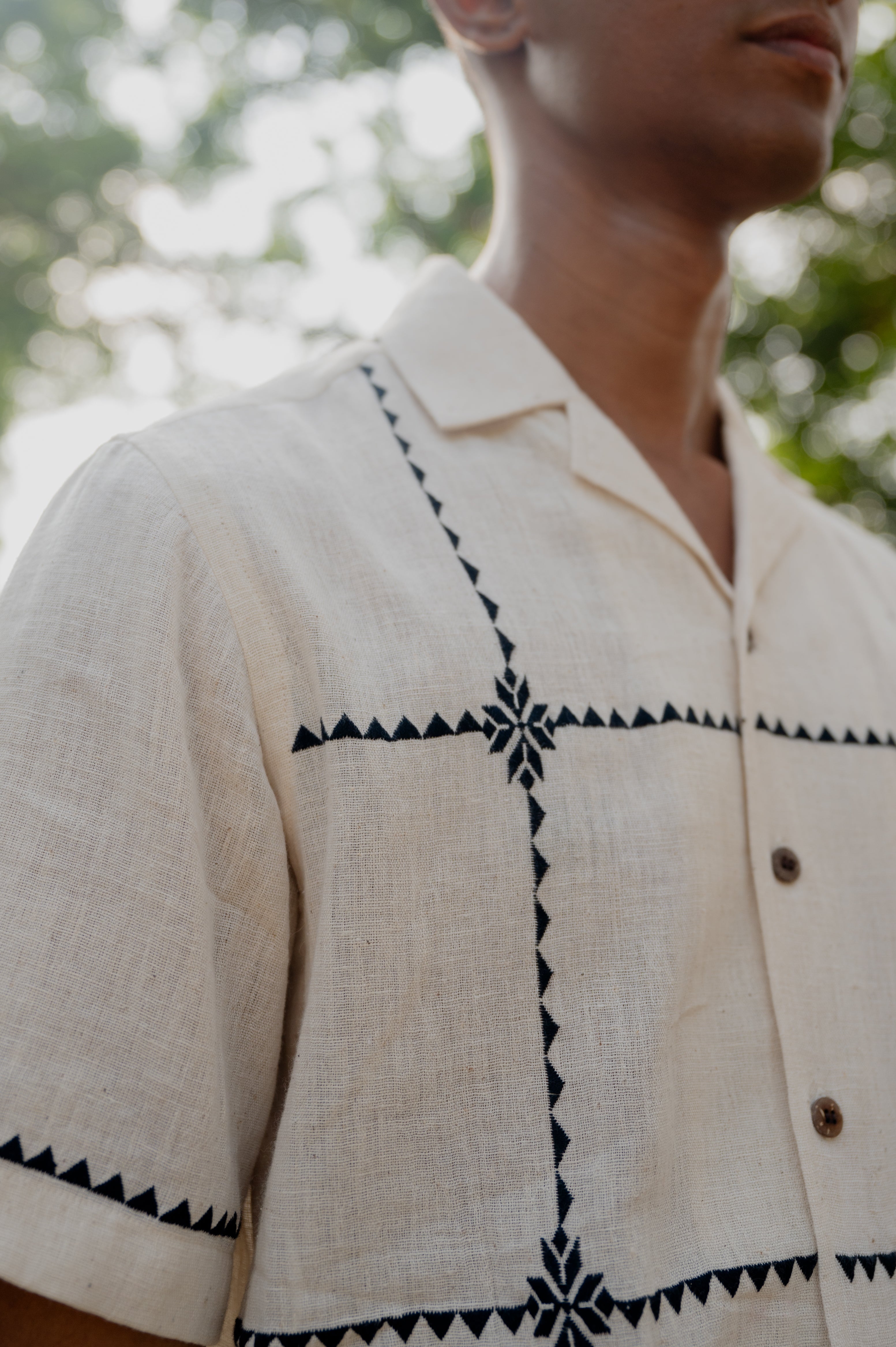 Close of the suf embroidered chequered kala cotton shirt